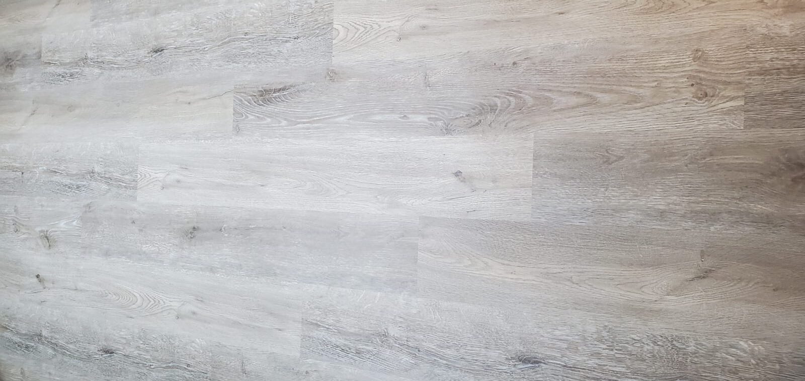 High-quality durable laminate flooring professionally installed by Insta Flooring Ltd in Beaver Bank.