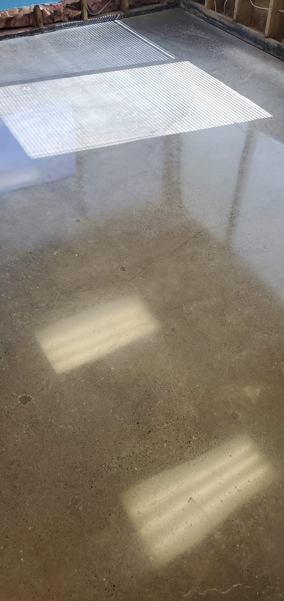 Concrete grind and seal floors for a modern Halifax home, completed by Insta Flooring.