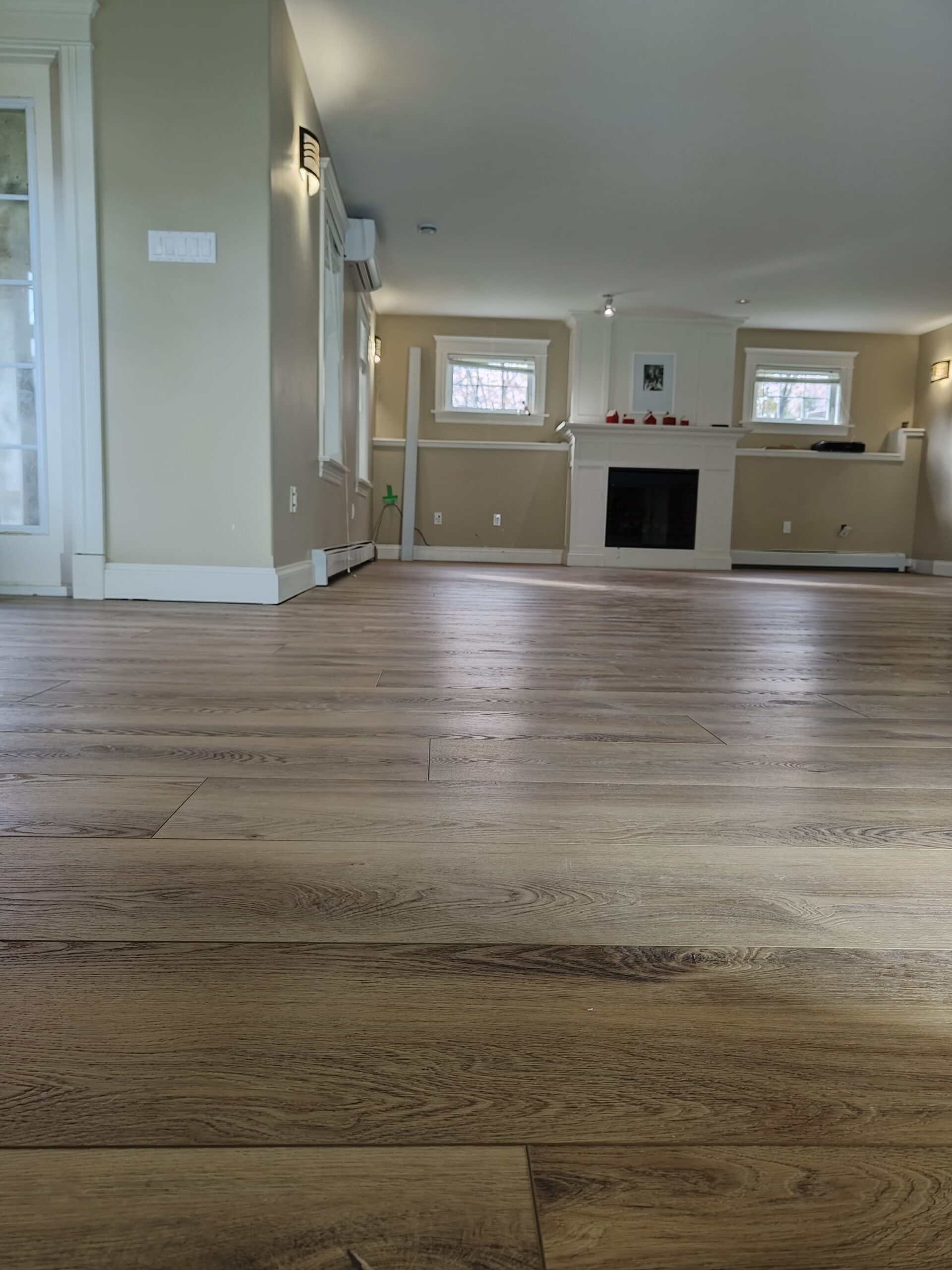 LVP flooring installation in a Beaver Bank living room renovation.